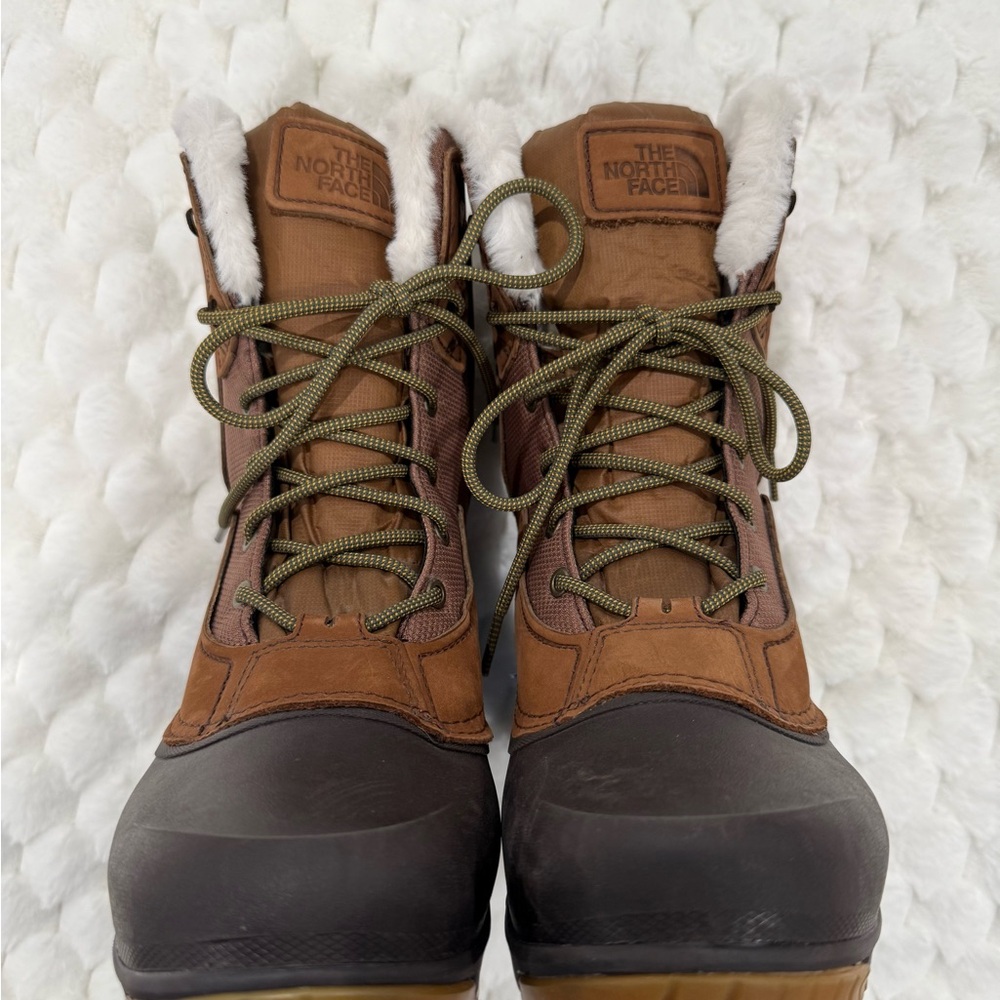 The North Face Brown Women’s Insulated Winter Boots with Faux fur lining.